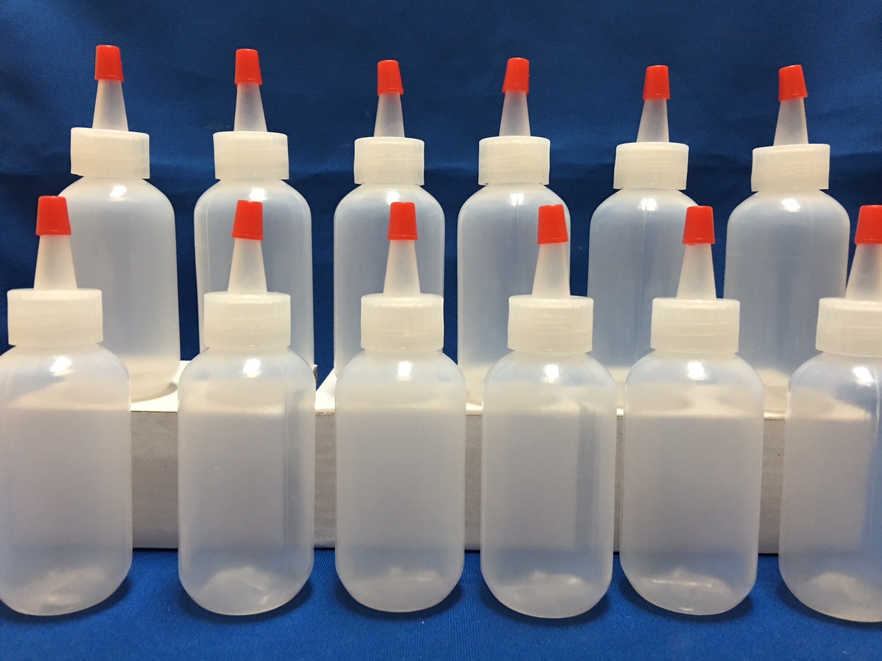 6 pack of 2oz (60mL) Plastic Boston Round Squeeze Bottles with Yorker Caps HDPE