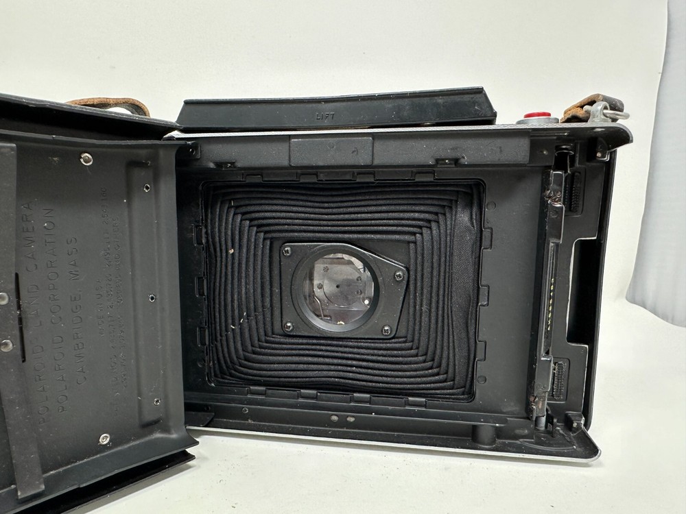 Polaroid Folding Land Camera Vintage Automatic 100 with strap booklets UNTESTED