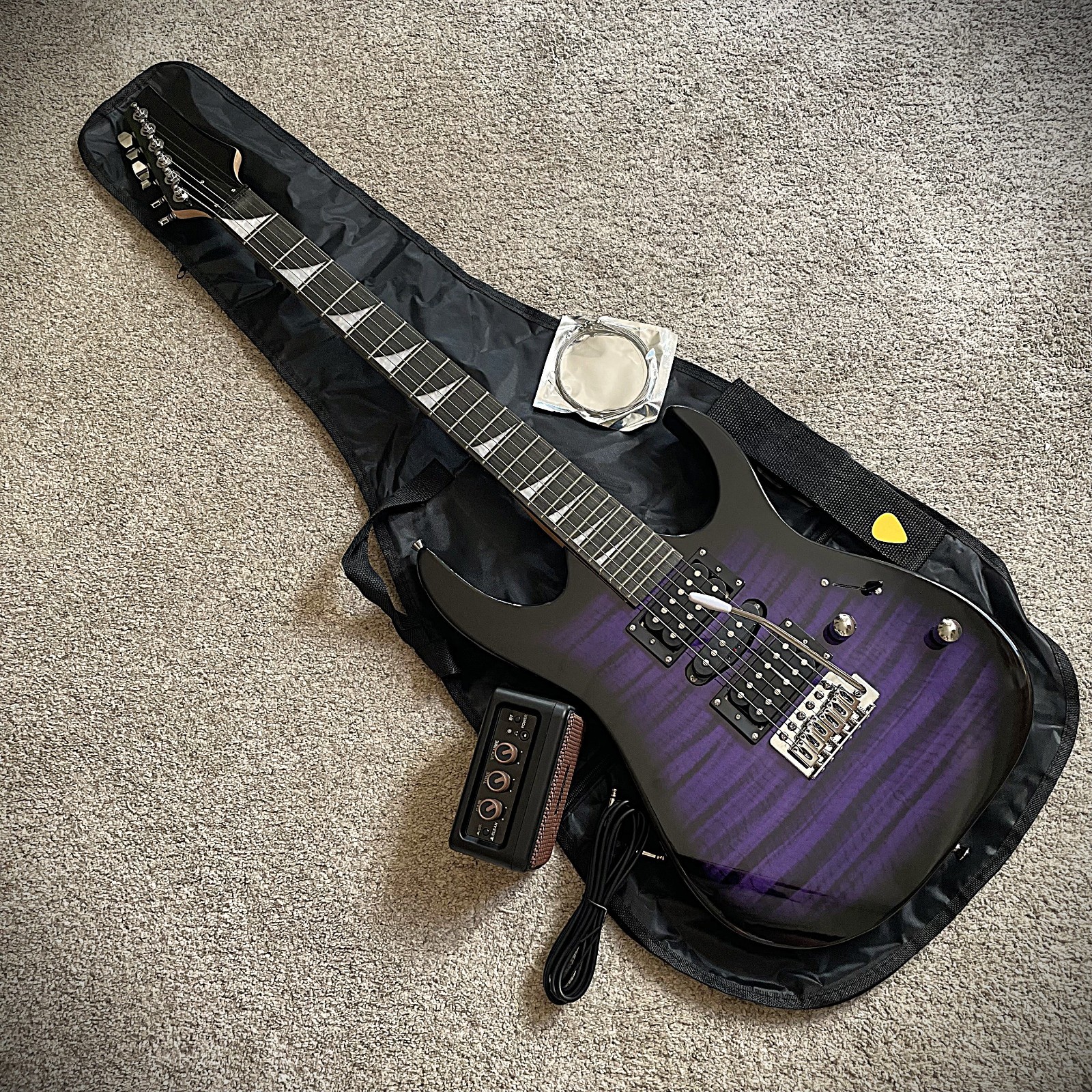 Full-Size Purple Electric Guitar and 5-Watt Amp Starter Package with Accessories