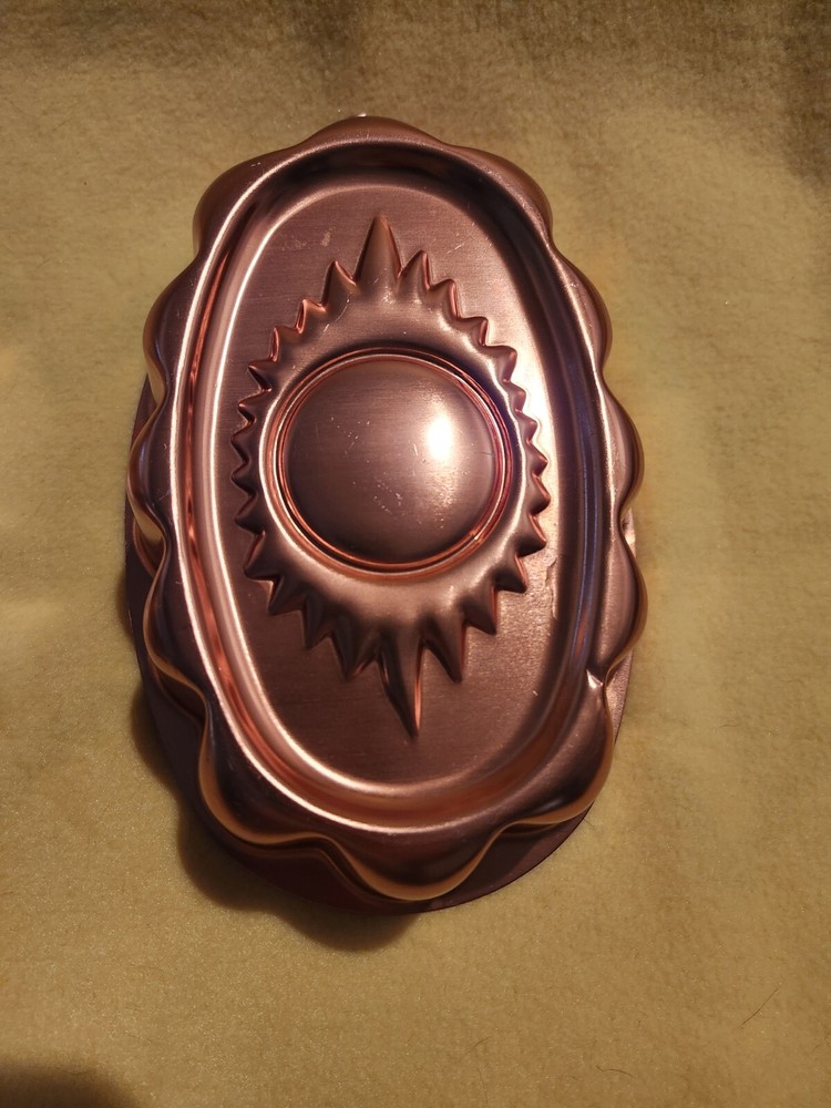 Decorative Baking Set. Cooper Looking Pans With Design And Hanging Hooks
