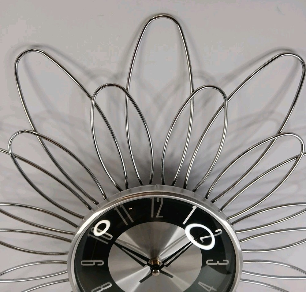 Mid Century Modern Starburst Silver and Black Wall Clock