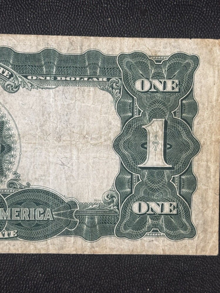 This is an 1899 $1 Silver Certificate, also known as the "Black Eagle" note.