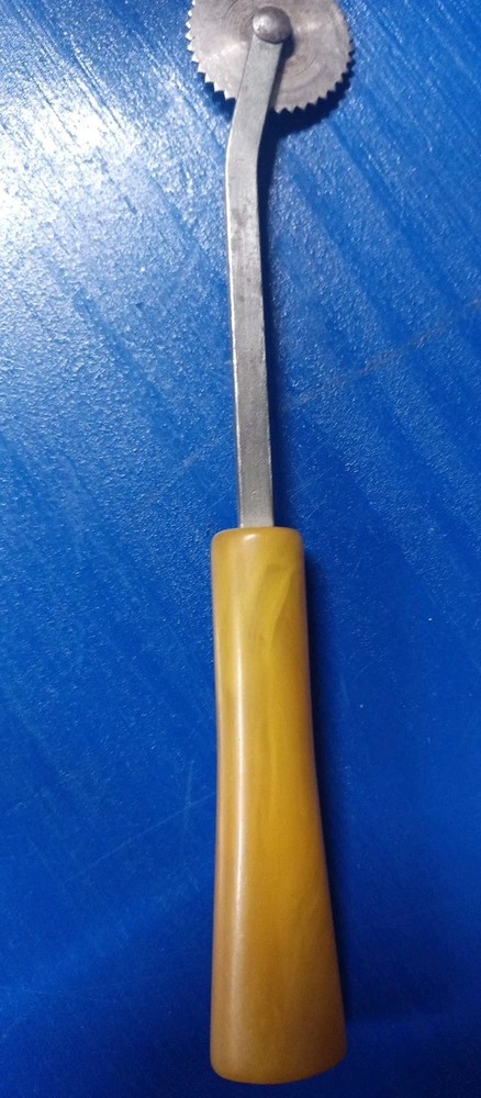 Vintage Sewing Pattern Tracing Tool Butterscotch Bakelite Handle
