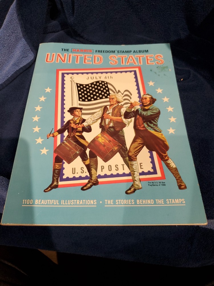 Vintage Harris Freedom Stamp Album  unused  1979 also has pack of misc stamps