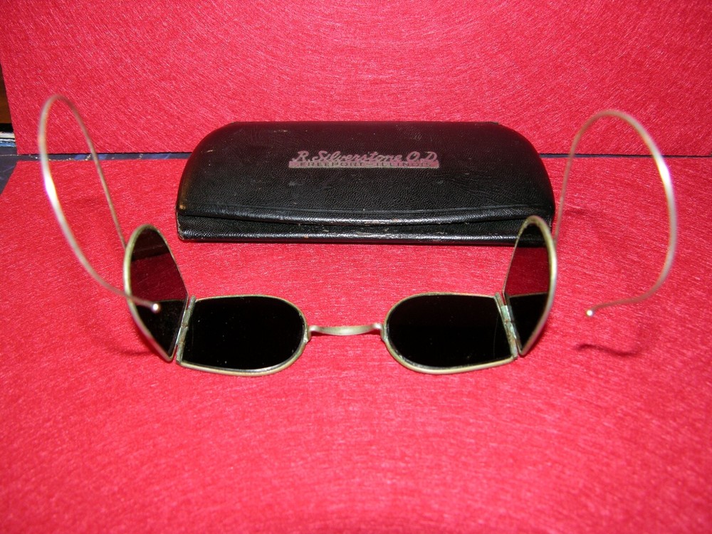 Antique welding glasses with case