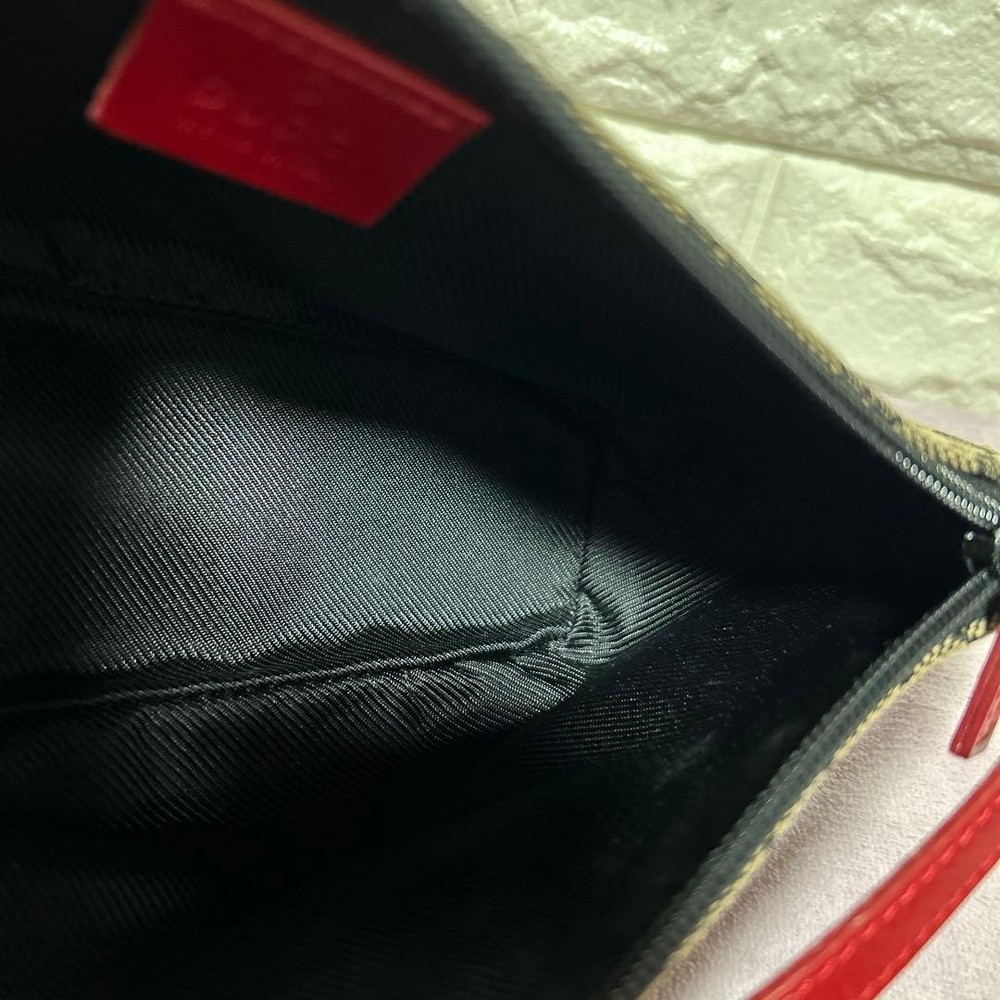 Gucci Accessory Pouch GG Canvas Handbag