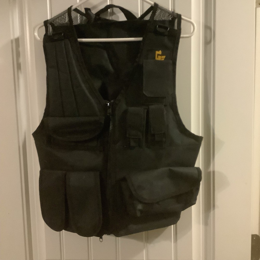 Large Black Nylon Tactical utility Vest Adjustable with Multiple Pockets.