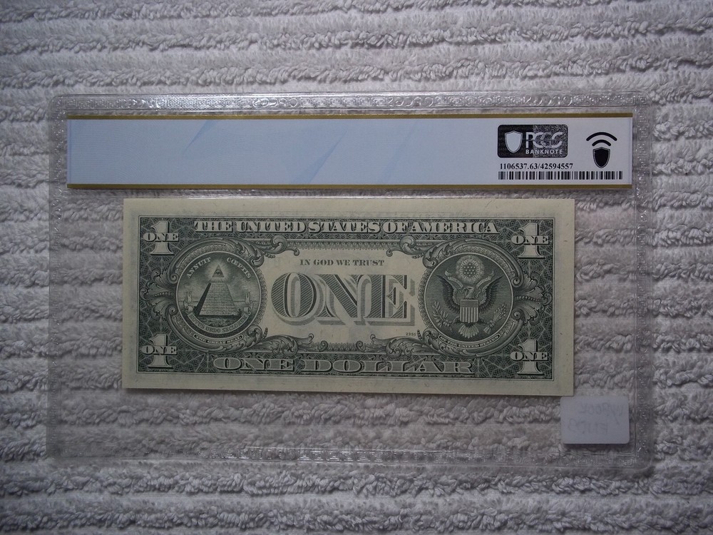 1977 $1 ERROR - Insufficient Inking PCGS 64 PPQ #E31 With BOOK ENDS LOOK