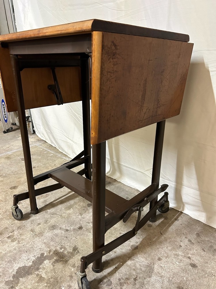 Unique rustic industrial steampunk drop leaf utility table, steel base