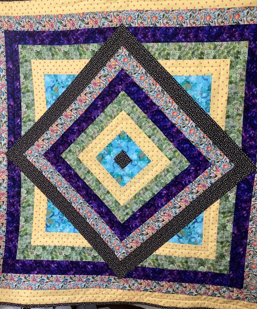 Handmade colorful lap quilt