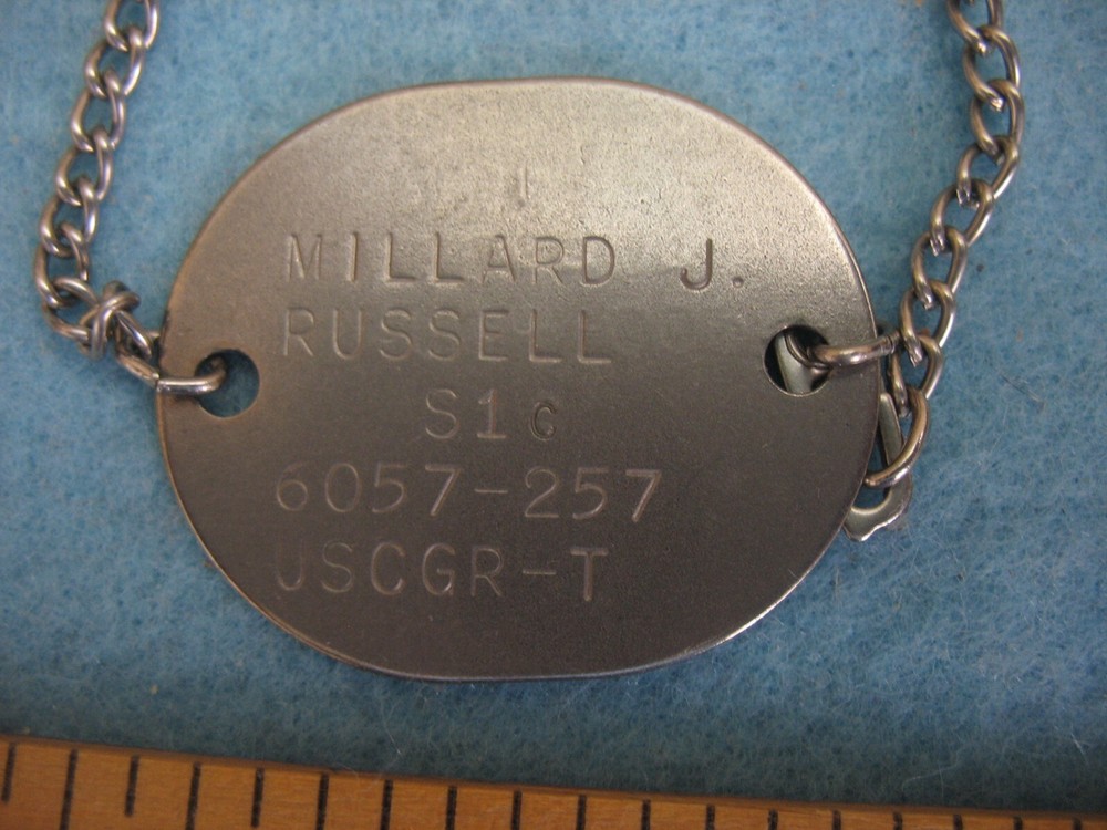 Original WWII US Coast Guard Reserve T 600 Hrs. Service Award Dog Tag on chain.