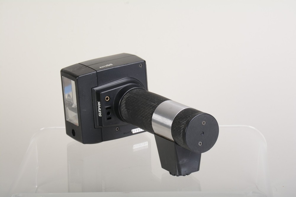 Sunpak Auto 511 Handle Mount Flash w/ Bracket. Fair condition. Tested Good 498