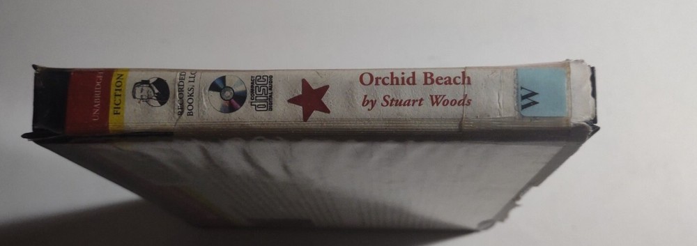 Orchid Beach by Stuart Woods. 7 Compact Discs. Missing Disc 8.