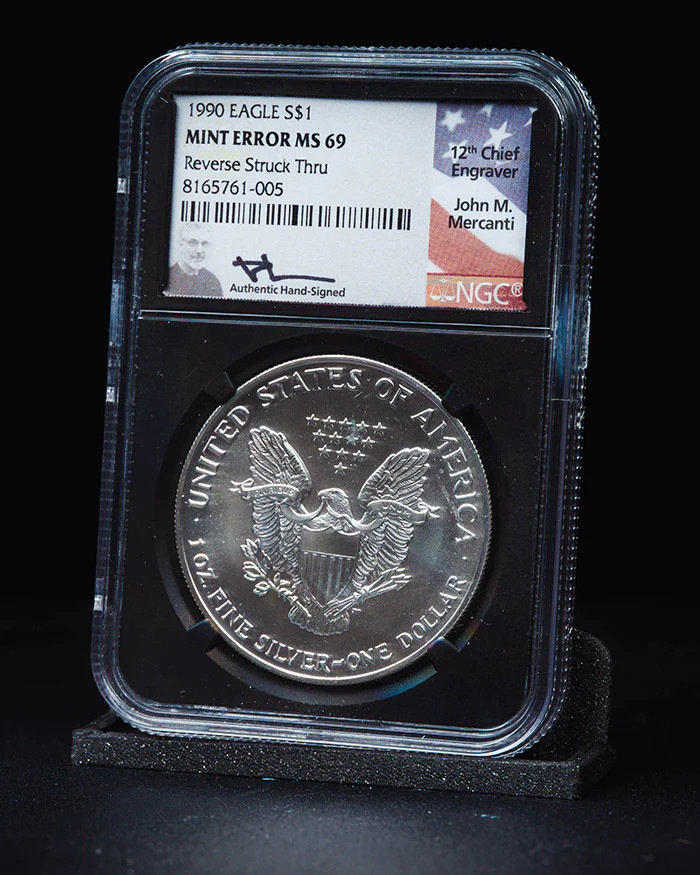 1990 SE $1 NGC MS69 Reverse Struck Thru Error John Mercanti Autographed