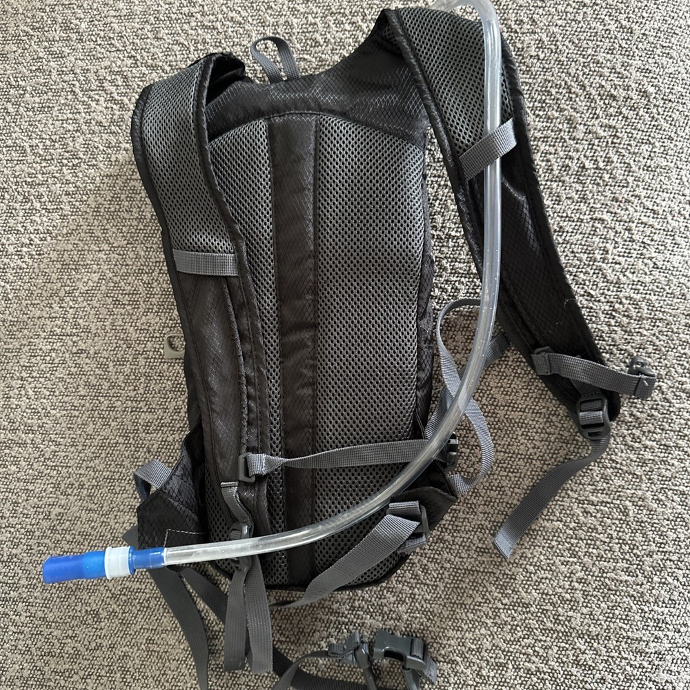 Ozark Trail Hydration Backpack with Hydration Bladder 2L Black Needs Cleaned