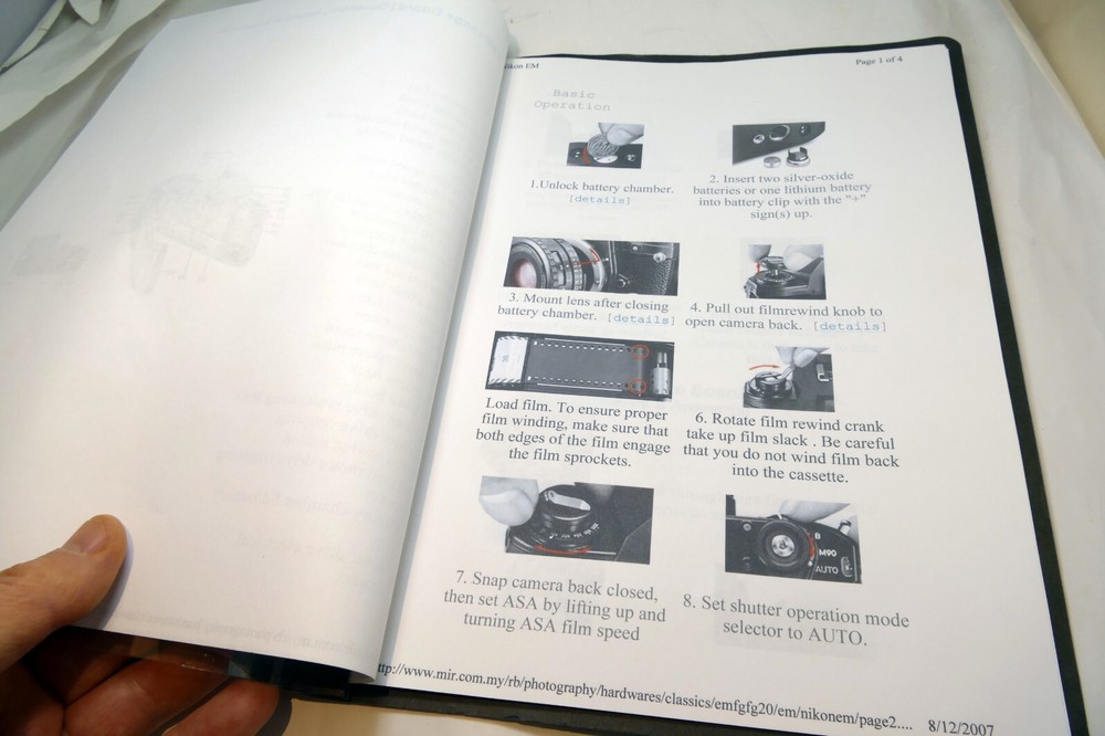 Camera guide instruction manual printed and bound folder for Nikon EM