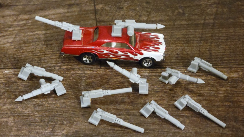 Adjustable, Moves Up or Down Weapons Pack Gray 3d printed. 1/64 scale. 11 items