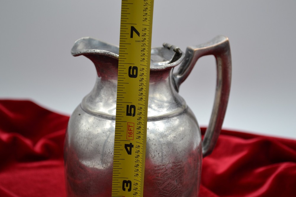 new weston hotel silver plated pitcher
