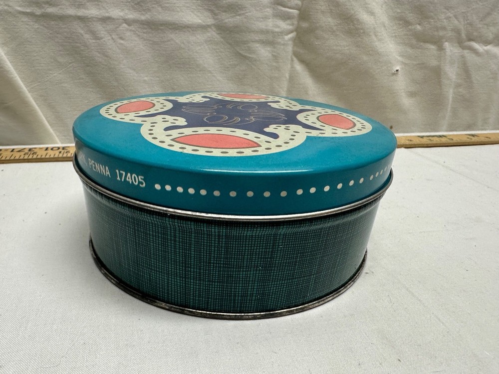 D. E. Wolfgang Candy Tin - 6 inch round