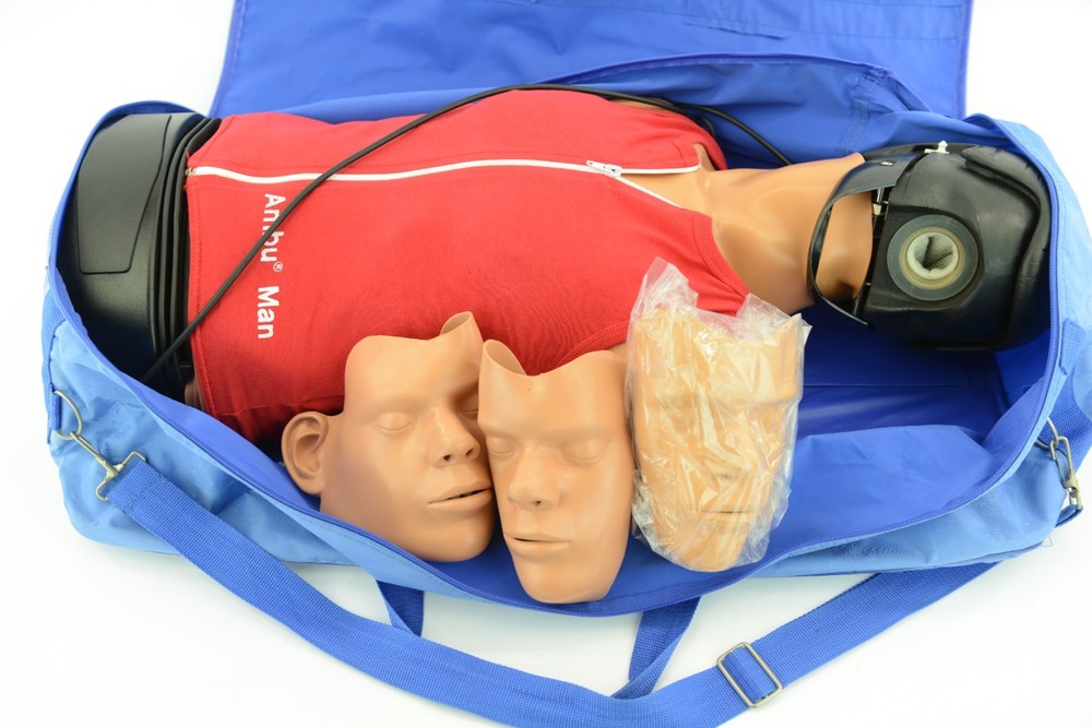 Ambu Man CPR Training Manikin W/ Blue Case & Extra Faces
