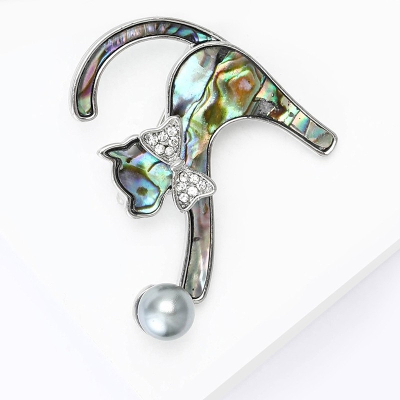 Versatile Shell Cats Pin Featuring Crystal Embellishments And Secure Fastener
