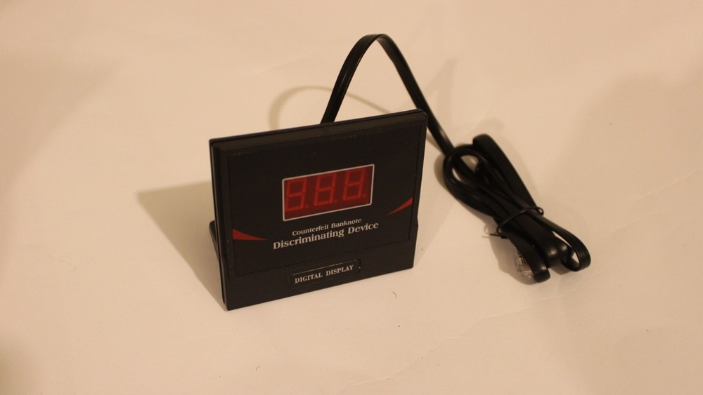 counterfeit banknote discriminating device