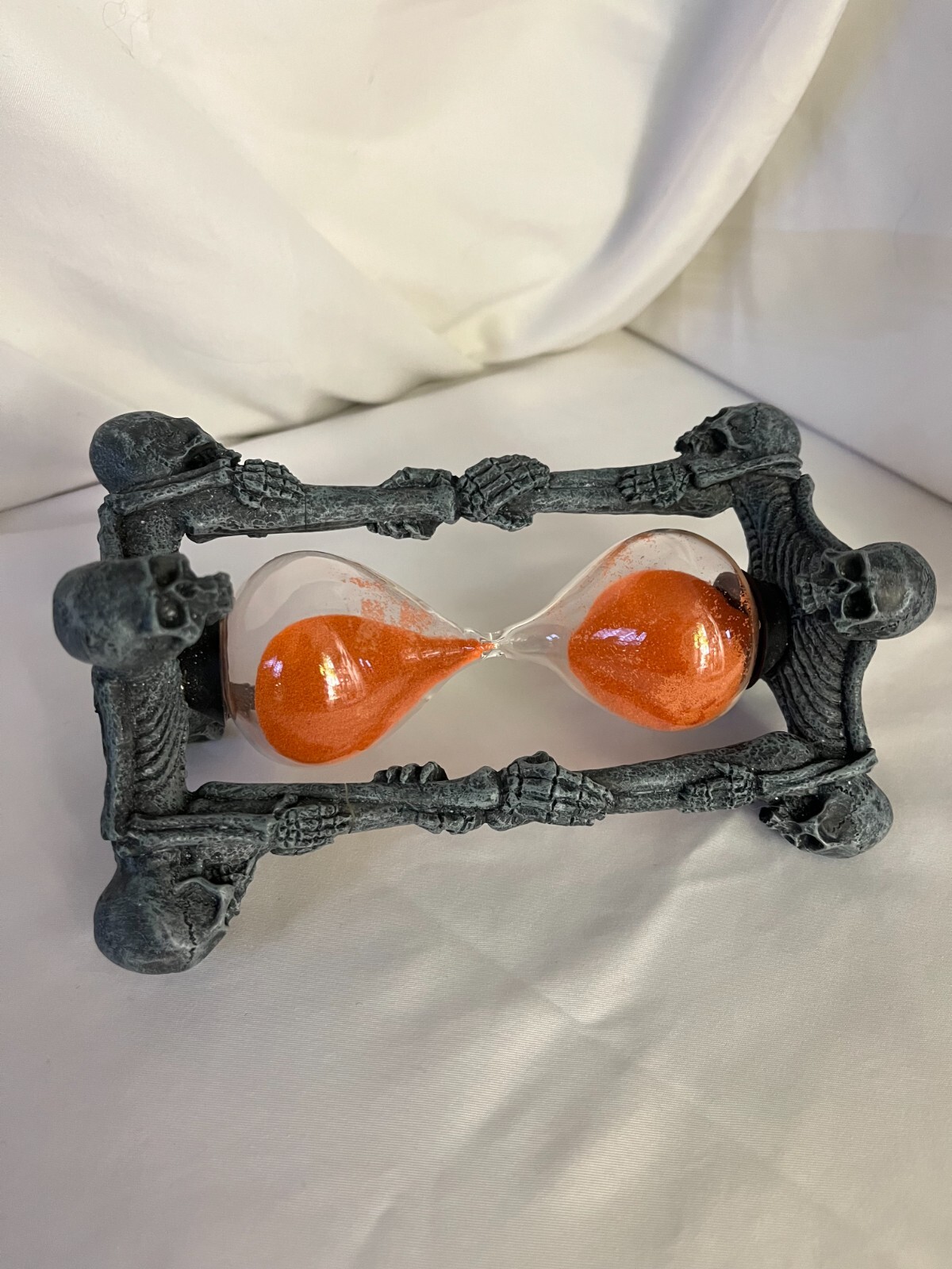 Hourglass Skeletons w/orange sand