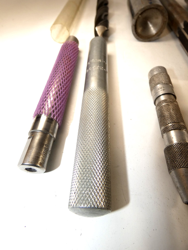 Set of eleven machinist tools, extractors, bits, etc.