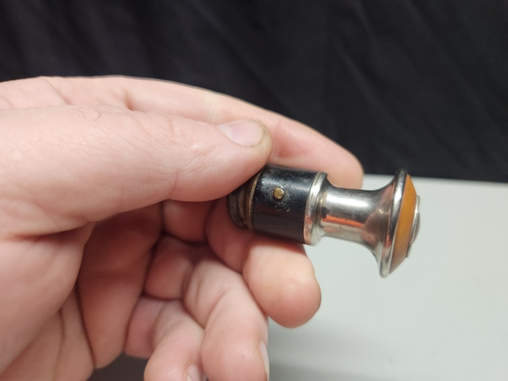 Packard Cigarette Lighter Cats Eye Bakelite Trim