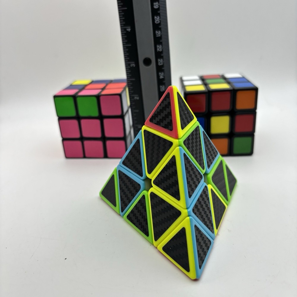 2 - Rubiks Cubes and 1 - Pyraminx Triangle Puzzle. VG Condition.