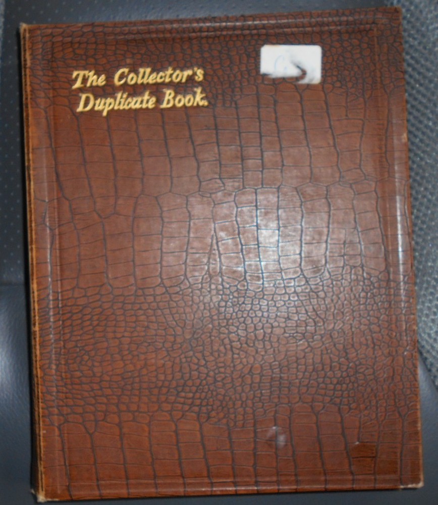 Brown stockbook; 12 /2 pages each with 11 pockets [total 264 pockets]