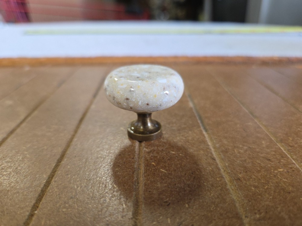1.25 inch beige stone round cabinet knobs antique brass base