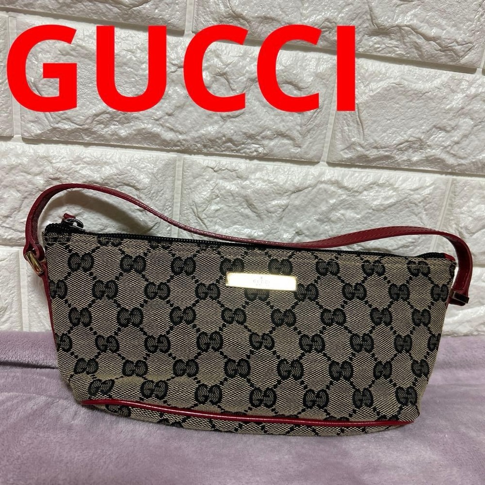 Gucci Accessory Pouch GG Canvas Handbag