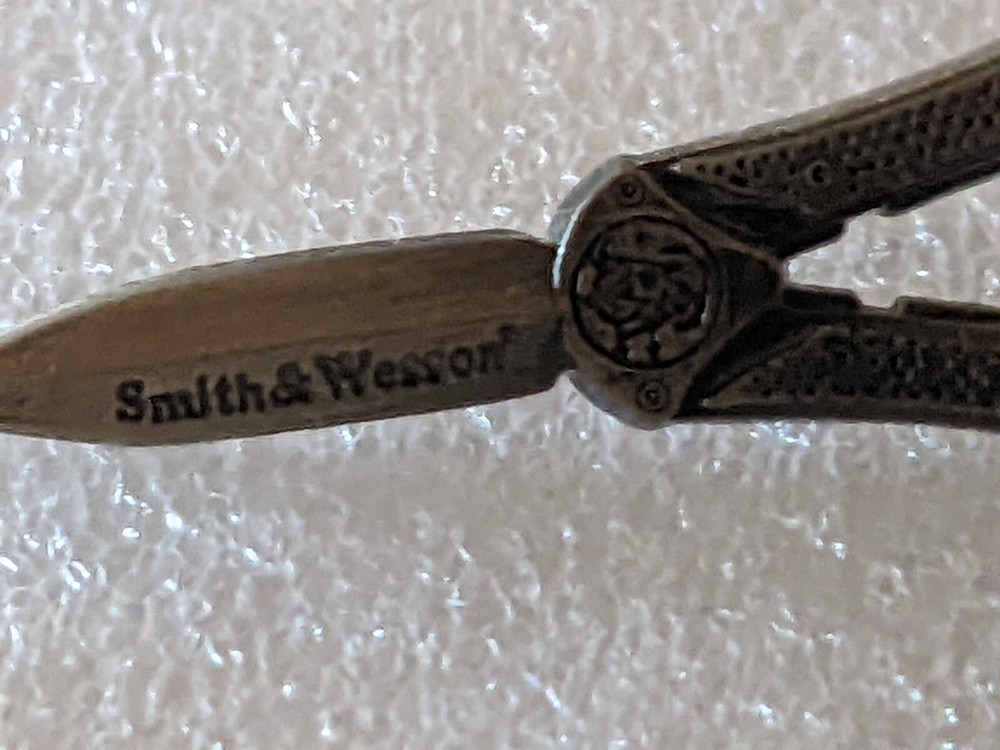 VINTAGE SMITH AND WESSON HAT/ LAPEL PIN
