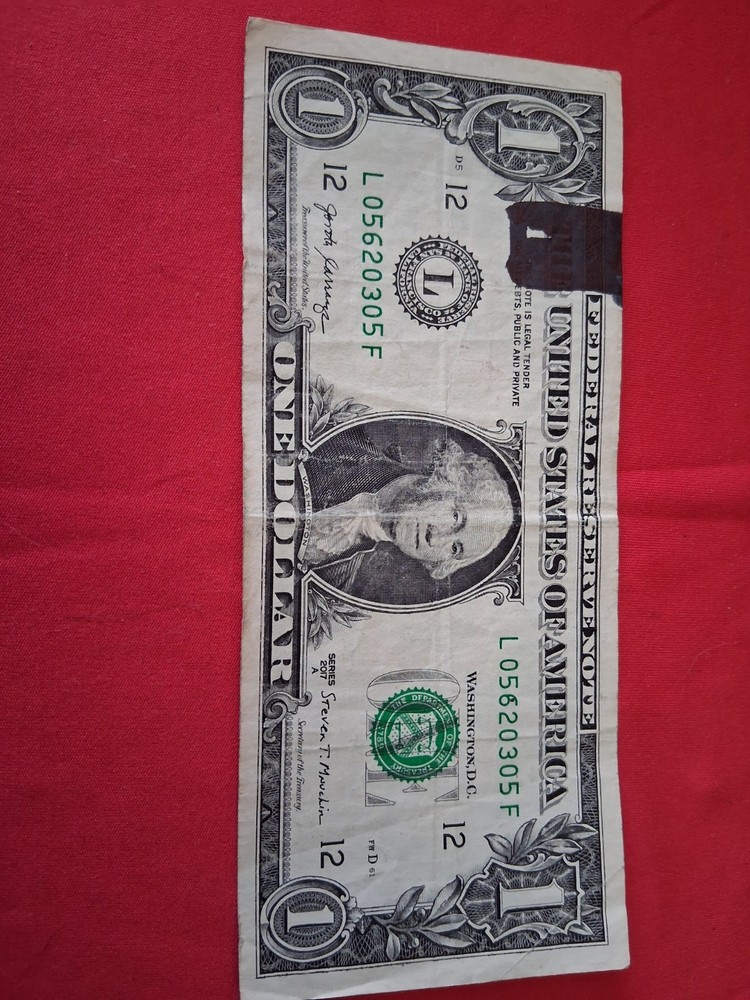 $1 Ink Smear Error with Bleed Through