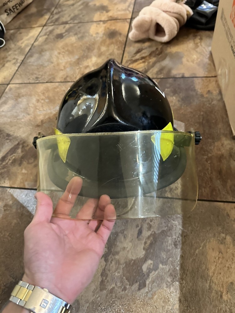 Cairns & Brothers fire helmet