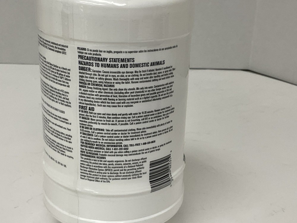 Ecolab 6100975 Low Temp Laundry Solid Chlorine Sanitizer Container 4 lbs