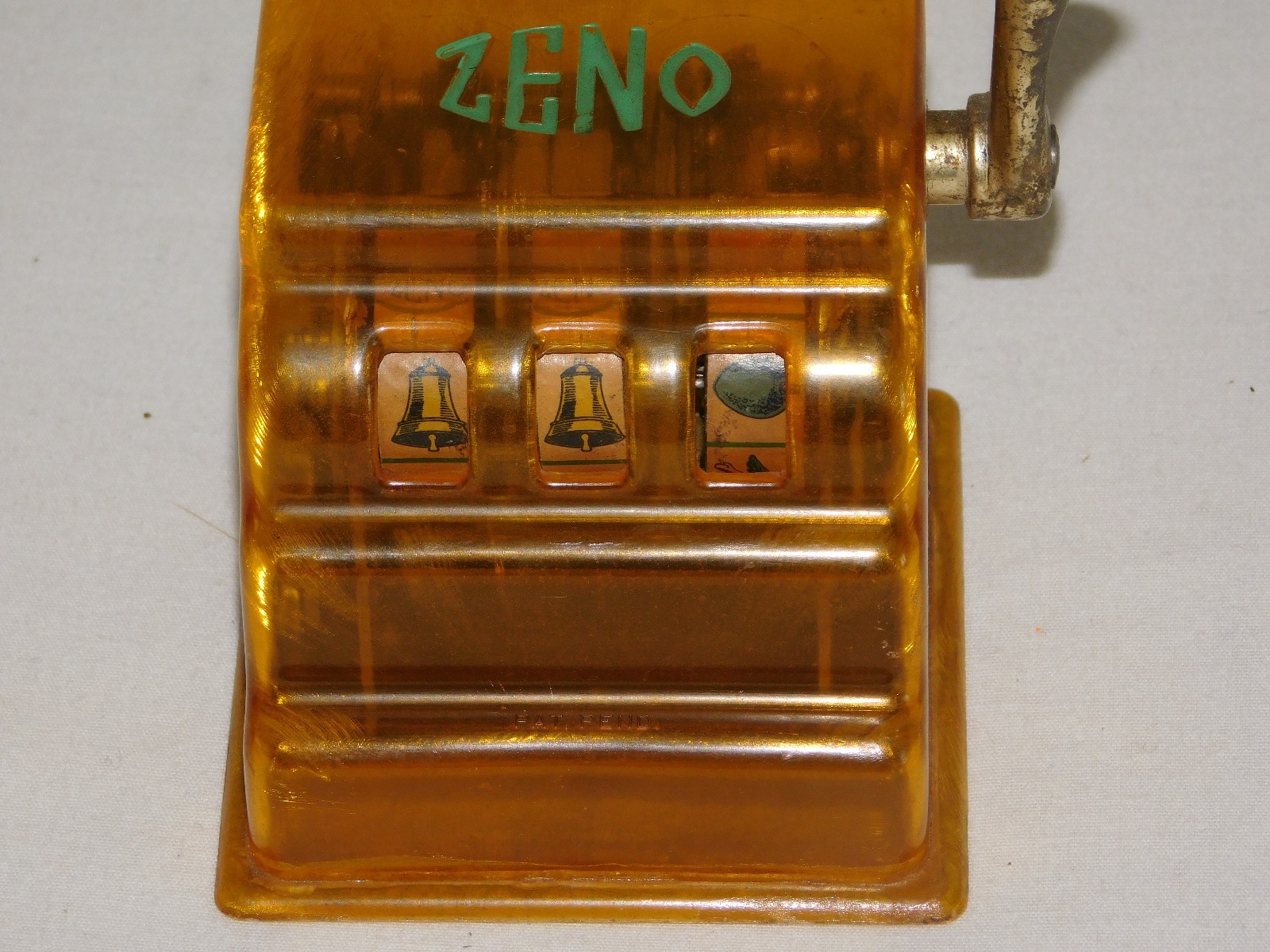 VINTAGE TRADE STIMULATOR 3 1/4" HIGH ZENO TOY SLOT MACHINE