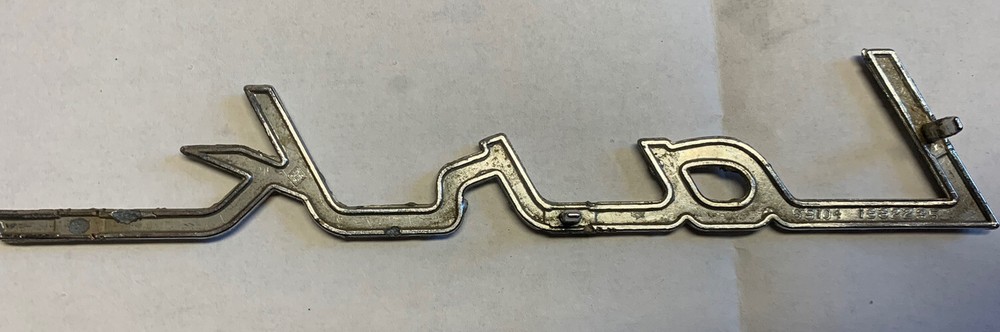 VINTAGE STUDEBAKER LARK METAL EMBLEM Read