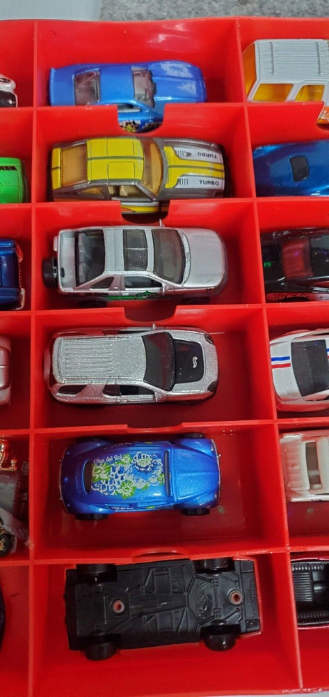 45 Hot Wheels/Hasbro/Misc vehicles in Plastic Red storage case.