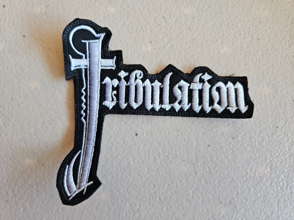 TRIBULATION, SEW ON WHITE EMBROIDERED PATCH