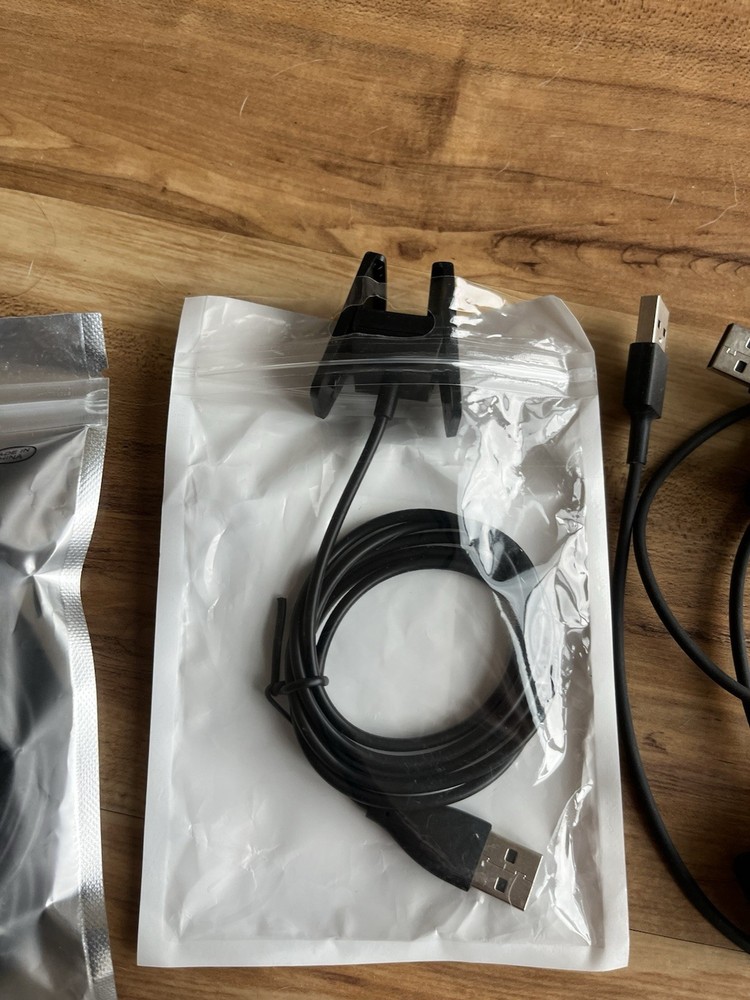 Various Fitbit accessories & Fitbit inspire 2 complete untested , bands chargers