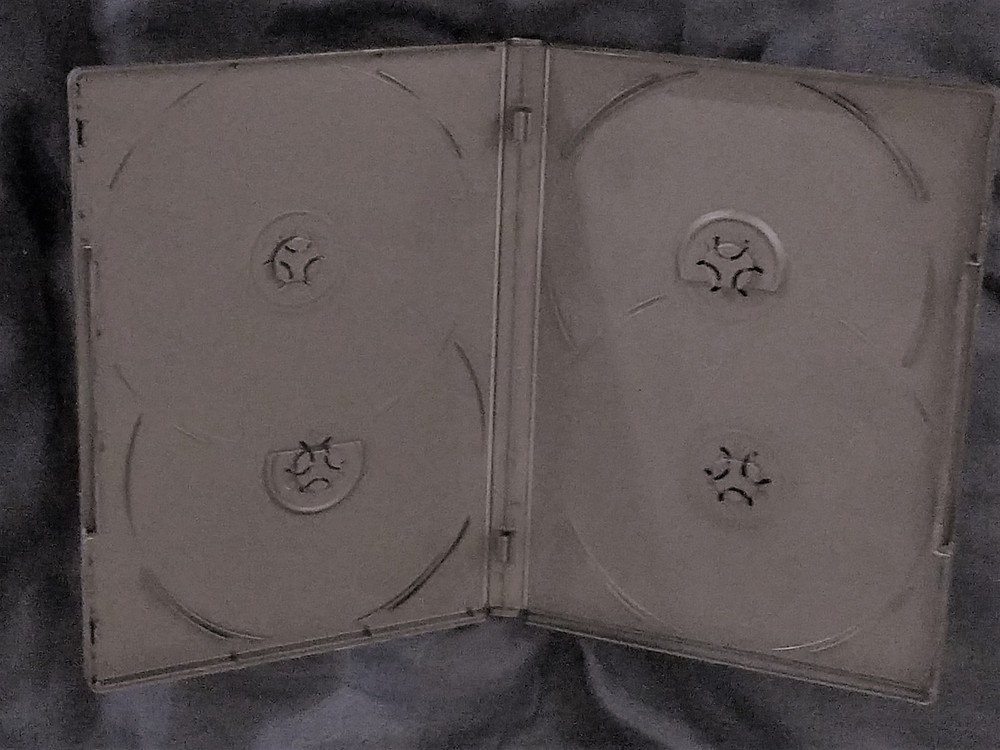 BLANK BLACK DVD CASE- HOLDS 4 DVDS!!