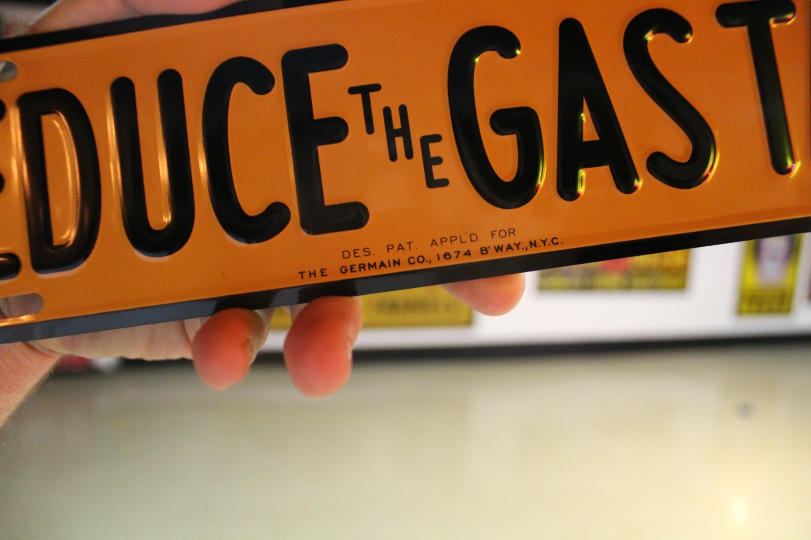 RARE REDUCE THE GAS TAX PLATE TOPPER EMBOSSED METAL SIGN SALES GAS OIL FORD