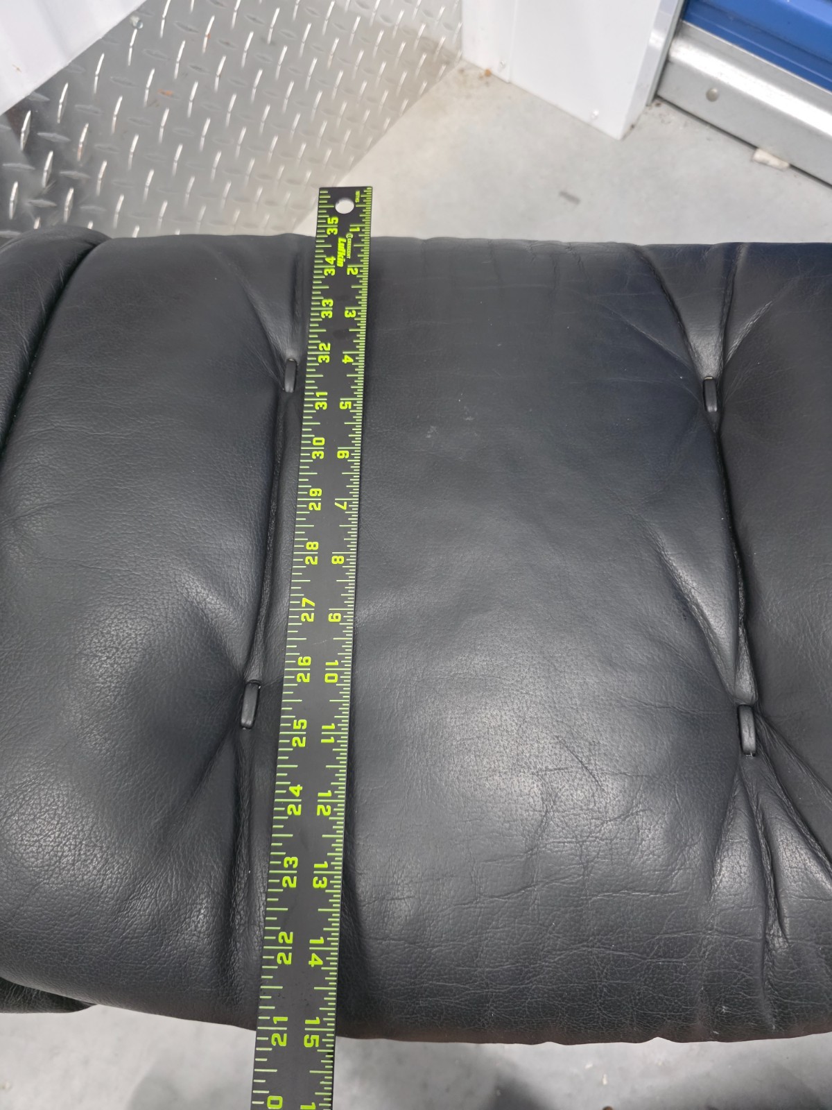 Ekornes Stressless Black Colored Leather Ottoman | Teak Stained Wood Base