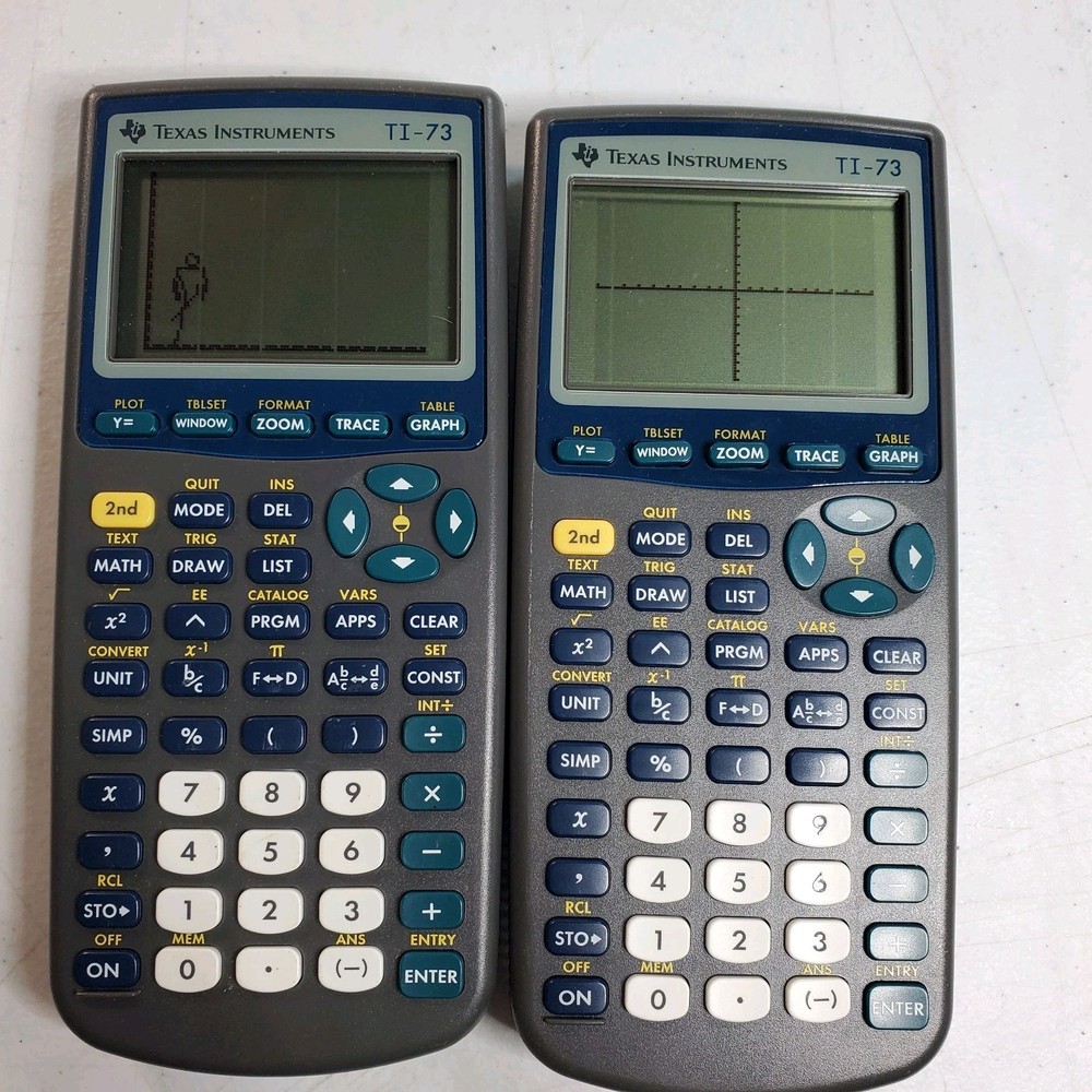 Two Texas Instruments TI-73 Graphing Calculators Used - WORK