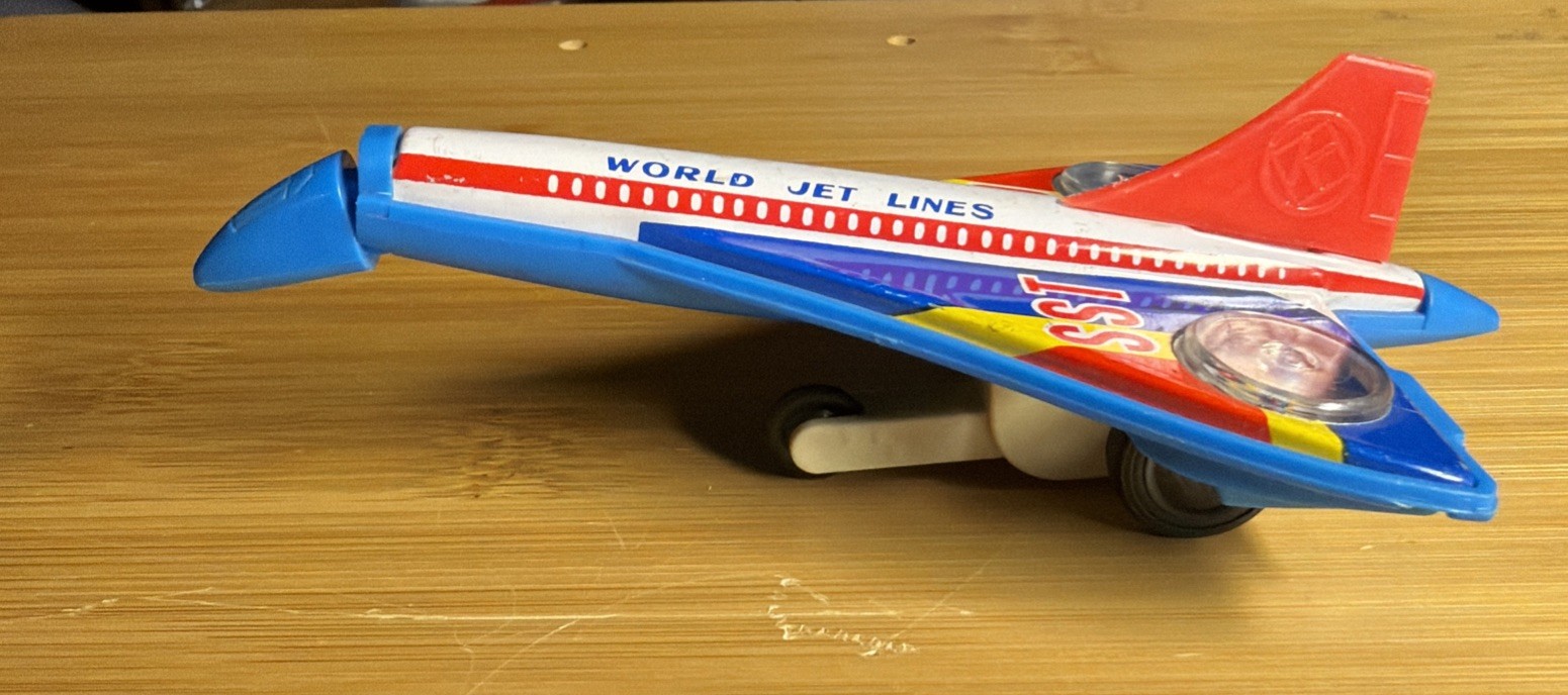 VINTAGE SPARKING SST 5" JET PLANE FRICTION POWERED METAL TOY JAPAN