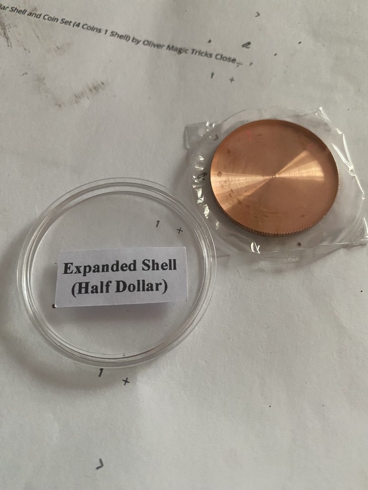 Half Dollar Expanded Coin Magic Trick