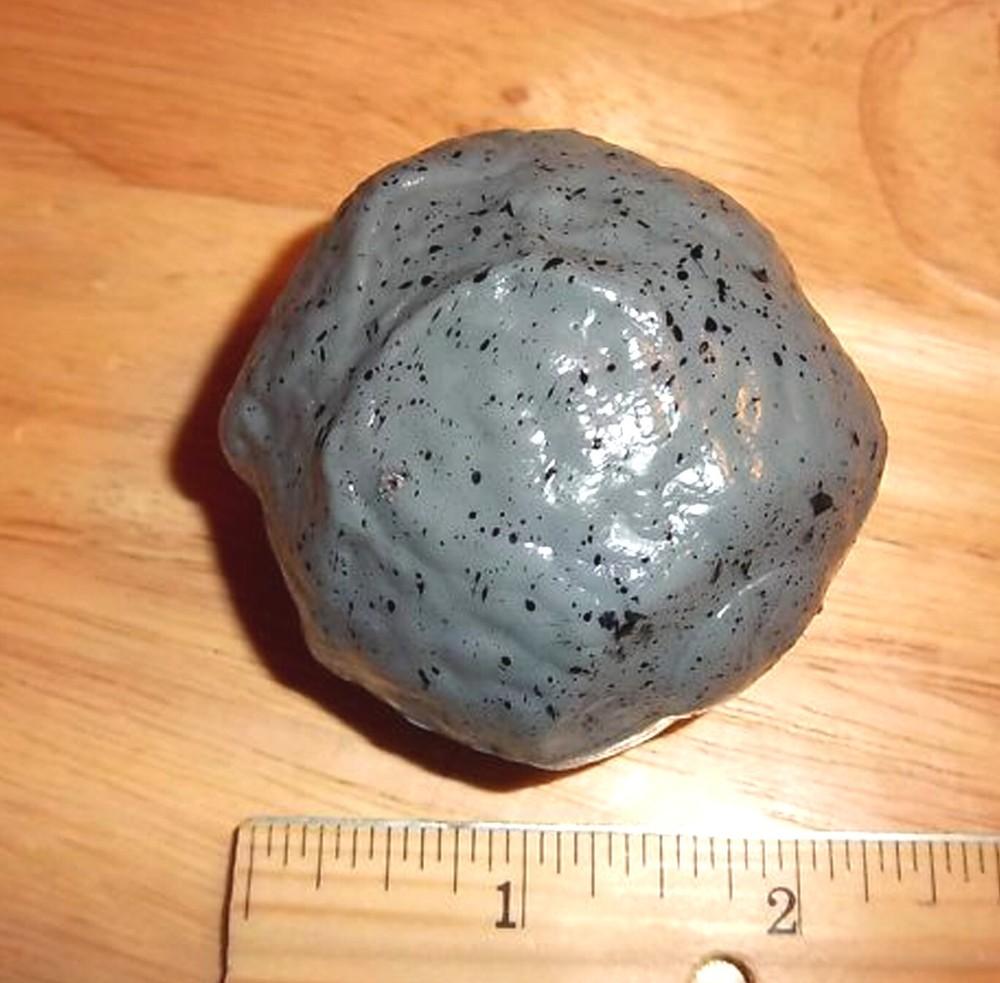 Splat rock toy, splats flat then morphs back! throw on a smooth clean surface