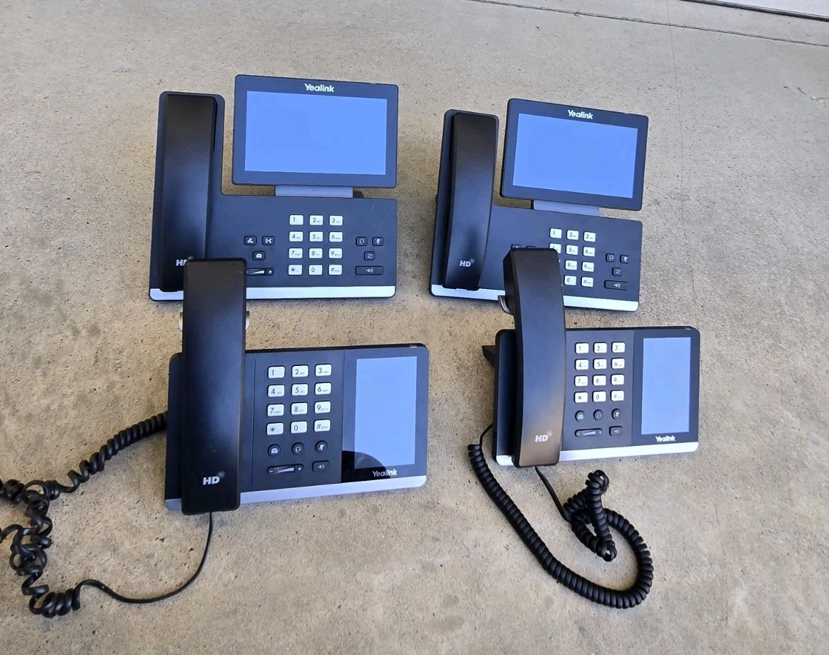 Lot of Yealink Smart Business Phones (2) SIP-T58A +  (2) SIP-T55A
